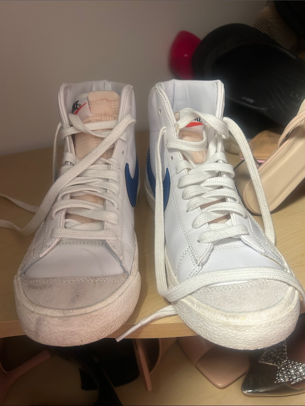 Nike White High-Top Sneakers with Blue Swoosh- barely used- one needs cleaning